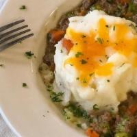 Shepherd'S Pie · A traditional Shepherd's Pie made with  ground beef, carrots, peas, onions and fresh herbs t...
