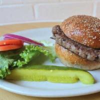 Trident Burger* · Juicy all-beef hamburger cooked to your specification. with lettuce, tomato, and onion on th...