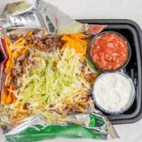 Walking Tacos · Ground Beef, shredded cheese and shredded lettuce with chip (salsa and sour cream optional)