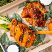 Chicken Wings · 12 pcs Buffalo or BBQ with Blue Cheese, Carrots & Celery