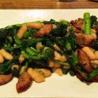 Sausage, Rabe, & Beans · Homemade Italian sausage sautéed with broccoli rabe and cannellini beans.