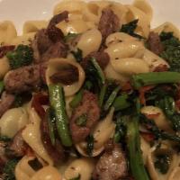 Orecchiette · Pasta ears with sausage, broccoli rabe, & sundried tomato, garlic, extra virgin olive oil & ...