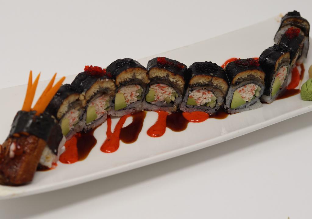 W245. Flying Dragon Roll · Eel lover choice, kani, avocado and cucumber decorated with eel and tobiko.