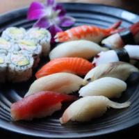 W260. Delight Platter · Chef's selected 10 pieces sushi and a California roll. Served with choice of side.