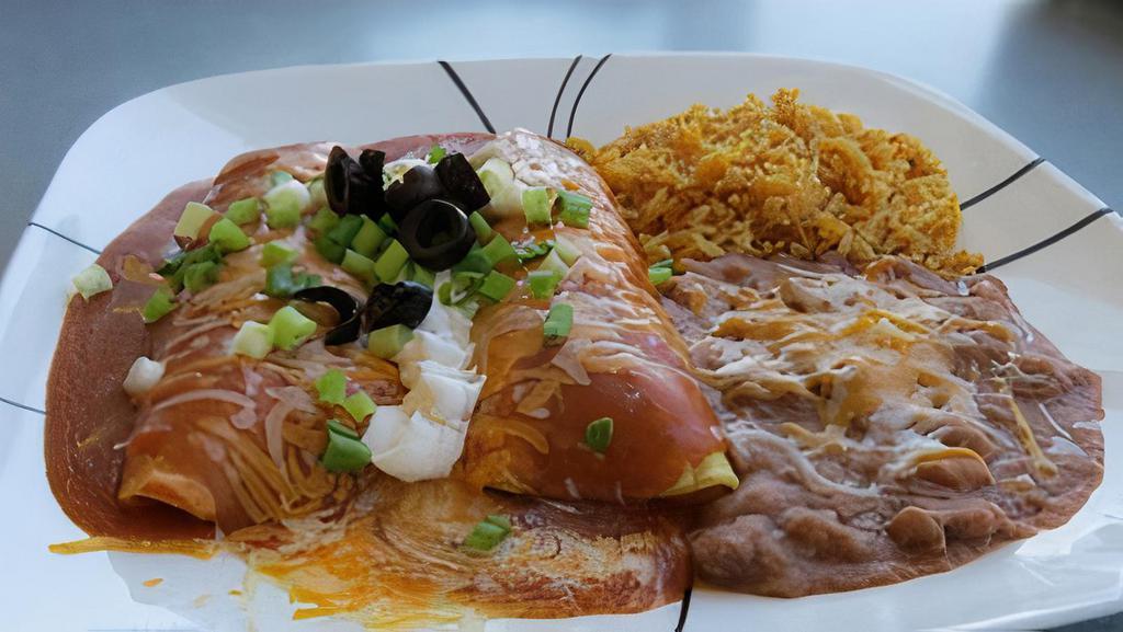 Two Meat Enchiladas · Comes with: cheese, sour cream, green onions and black olives. Your choice of meat, salsa and beans.