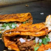 Birria Order · Grill Tortilla, Shredded Beef, Cheese, Onions and Cilantro Order comes with 3 Birria Tacos a...