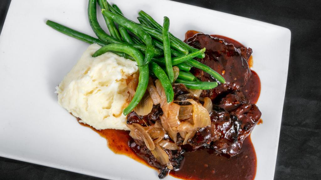 Steak Tips (G) · Bourbon glaze marinated, grilled balsamic onions, mashed potatoes, green beans