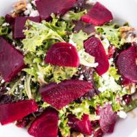 Beet Salad · Spring mix, local roasted beets, dried cranberries, goat cheese, candied walnuts, and balsam...