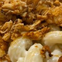 Buffalo Chicken Mac And Cheese · Creamy mac & cheese smothered in grilled and seasoned chicken breast tossed in Spicy Buffalo...