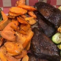 Grilled Veggie Platter · Portobello mushrooms, asparagus, squash, zucchini, and carrots. Served with a side of brusch...