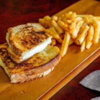 Grilled Cheese  · Grilled white bread and American cheese melted 
Served w/ French fríes