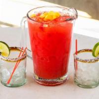 Betty Boop · House Tequila, Raspberry, Mango, fresh Orange and Lime juice.