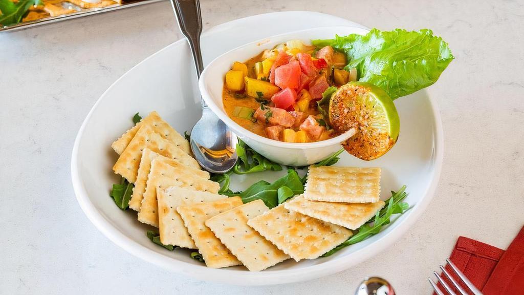 Tuna Ceviche · Lime juice, mango, avocado, chipotle. cucumber.. Served with tortilla chips