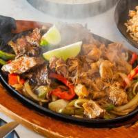 Fajitas Mixta · Any combination of two choices.. onions, peppers, flour tortilla.. Served with rice, and ref...