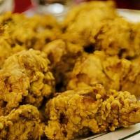 Pollo Frito - Fried Chicken · small pieces of fried chicken (dominican style) served with your choice of two sides.