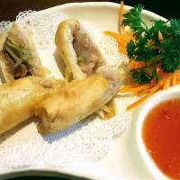 Duck Spring Roll · Fried with a side of sweet chili sauce.