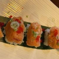 Crispy Rice With Spicy Tuna · Pan fried rice cakes topped spicy tuna, tobiko and scallions.