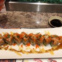 Red Dragon · Shrimp tempura, cucumber, avocado, top with crunchy and spicy tuna.