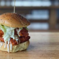 Chicken Sandwich: Buffalo · Golden fried chicken breast, our signature buffalo sauce, crumbled bleu cheese, shredded ice...