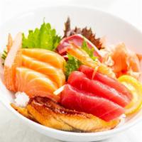 Chirashi Bowl  · Assorted sashimi, tuna, salmon, yellowtail, eel and shrimp over white rice.