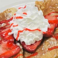 Strawberry Glazed Crepes
 · Topped with powdered sugar and whipped Cream