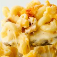 Lobster  Mac& Cheese · Maine lobster meat, elbow macaroni, cheddar cheese, cream, and spices