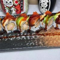 Black Dragon Roll · Shrimp tempura roll topped with eel avocado black tobiko, scallion and eel sauce.