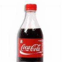 Coca-Cola® · Coca-Cola Soda.