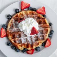 Belgian Waffle · Fluffy vanilla sugar waffle topped with powdered sugar & whipped cream
