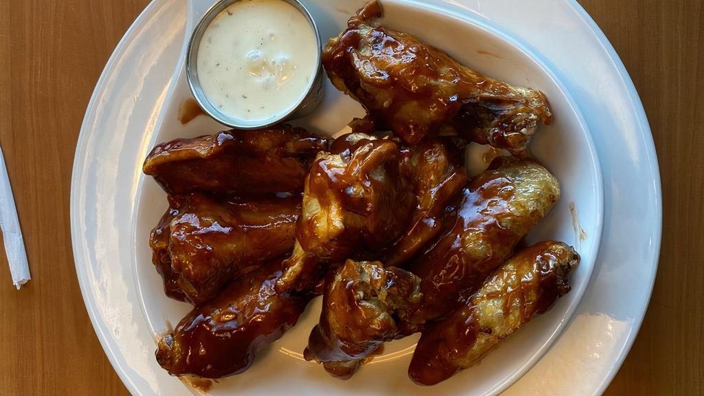 Boneless Chicken Wings · Crispy tenders tossed in your preference of our house-made buffalo or BBQ and a side of bleu cheese or ranch.