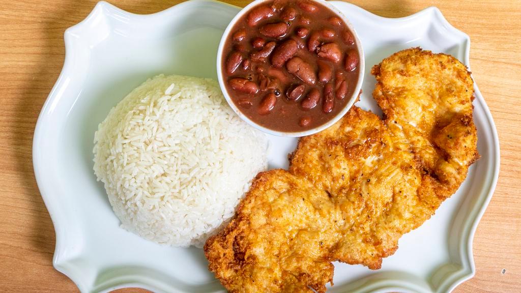 Menestra Pollo Apanado · Arroz, menestra y pollo apanado
Rice and beans with fried breaded chicken