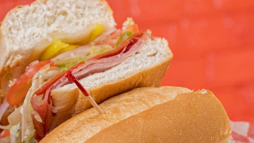 Italian Grinder · ham salami capiccola melted provolone cheese. lettuce tomatoes and onions