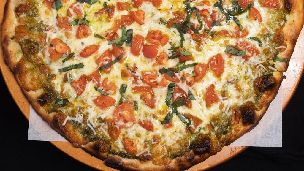 Pesto Pizza · Basil. garlic, olive oil, Parmesan cheese & mozzarella cheese.