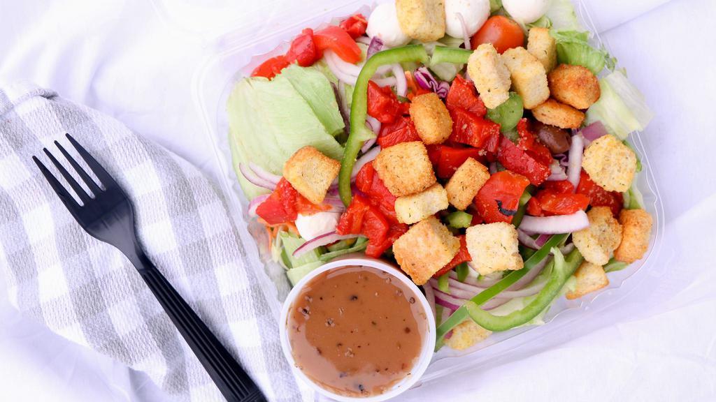 Fresh Mozzarella Salad · Tomato, carrots, cucumbers, red roasted pepper, olives & croutons.