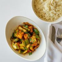 Chicken Mushroom Balti · Chicken with roasted onions, green pepper, mushrooms, herbs, and spices, garnished with cori...