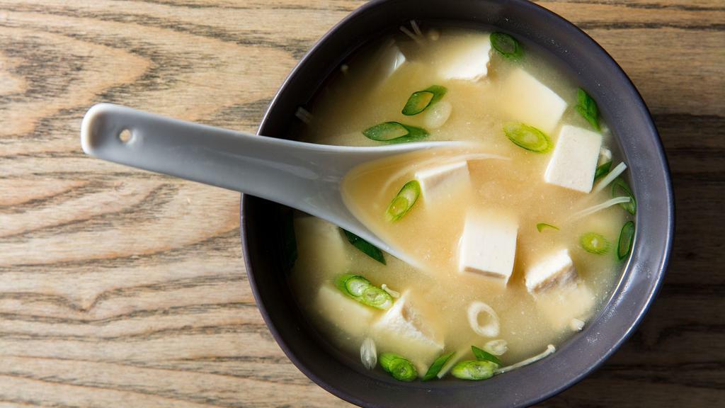 Miso Soup · Miso broth with tufo,scallions,and dry seaweed