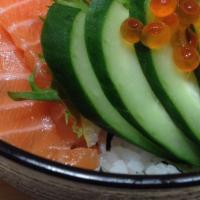 Salmon Don · Sliced raw salmon over a bed of sushi rice.
