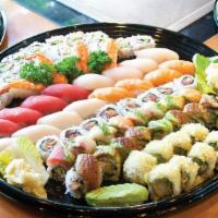 Sushi Maki Family (Sushi 15 Pcs + Maki 32 Pcs ) · 15 pieces Sushi and 8 Pieces rainbow maki, 8 Pieces spicy tuna maki, 8 Pieces spicy kani mak...