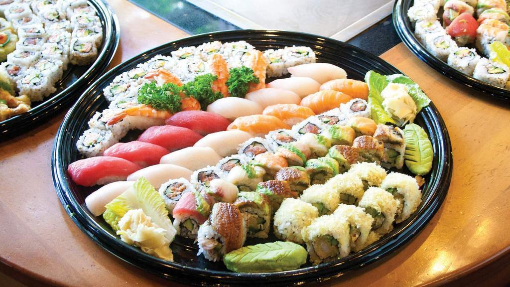 Sushi Maki Family (Sushi 15 Pcs + Maki 32 Pcs ) · 15 pieces Sushi and 8 Pieces rainbow maki, 8 Pieces spicy tuna maki, 8 Pieces spicy kani maki and 8 Pieces salmon avocado maki.