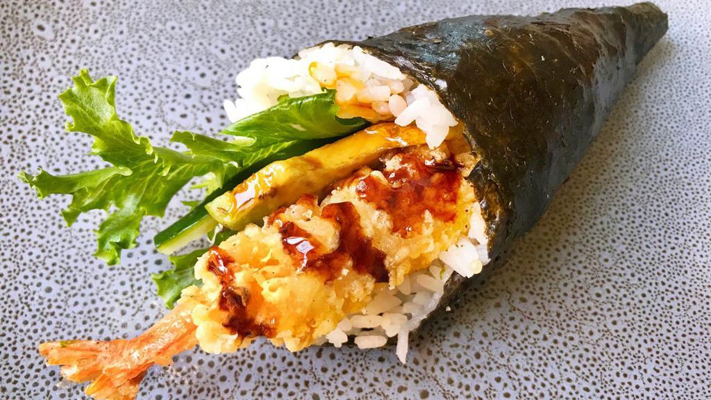 Shrimp Tempura Hand Roll · Shrimp tempura,‏ cucumber, avocado, and flying fish roe, with eel sauce.