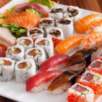 Maki Combo One ( 24 Pieces) · 8 Pieces Spicy salmon maki, 8 Pieces spicy tuna maki, and 8 Pieces California.Served with mi...