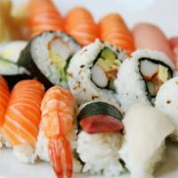 Sushi Deluxe · Chef's choice of nine pieces of nigiri and eight pieces of 8 Pieces tuna maki.