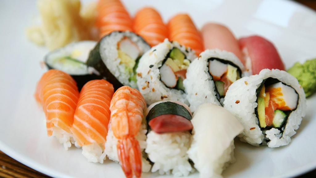 Sushi Deluxe · Chef's choice of nine pieces of nigiri and eight pieces of 8 Pieces tuna maki.