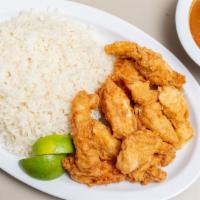 Pechurina · Chicken breast with rice or fried  plantains.
