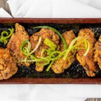 Korean Fried Chicken Wings · Eight pieces. Korean style fried wings coated with sauce of choice.