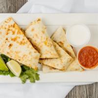Quesadilla · Your choice of meat served with pico de gallo, cheese and sour cream. Add Shrimp, Pork, Chic...