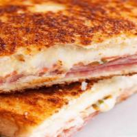 Grilled Cheese With Ham Sandwich · Cheesy grilled cheese sandwich with grilled ham on your choice of bread.