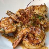 Gambas Al Ajillo · Griddled garlic shrimp, chilies, parsley, lemon.