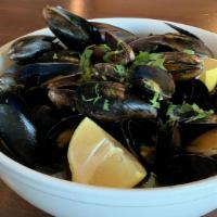 Mussels · Sautéed with red or white wine sauce.