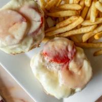 Tuna Melt · homemade tuna salad served on a soft bun with sliced tomato and provolone cheese baked in th...